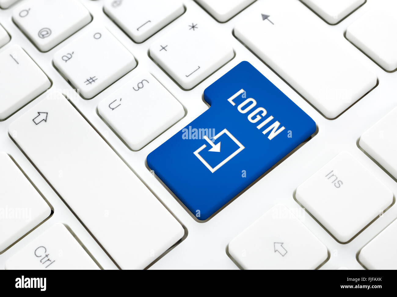 Concepto de negocio Inicio de sesión, introduzca el botón o tecla azul sobre blanco teclado Foto de stock