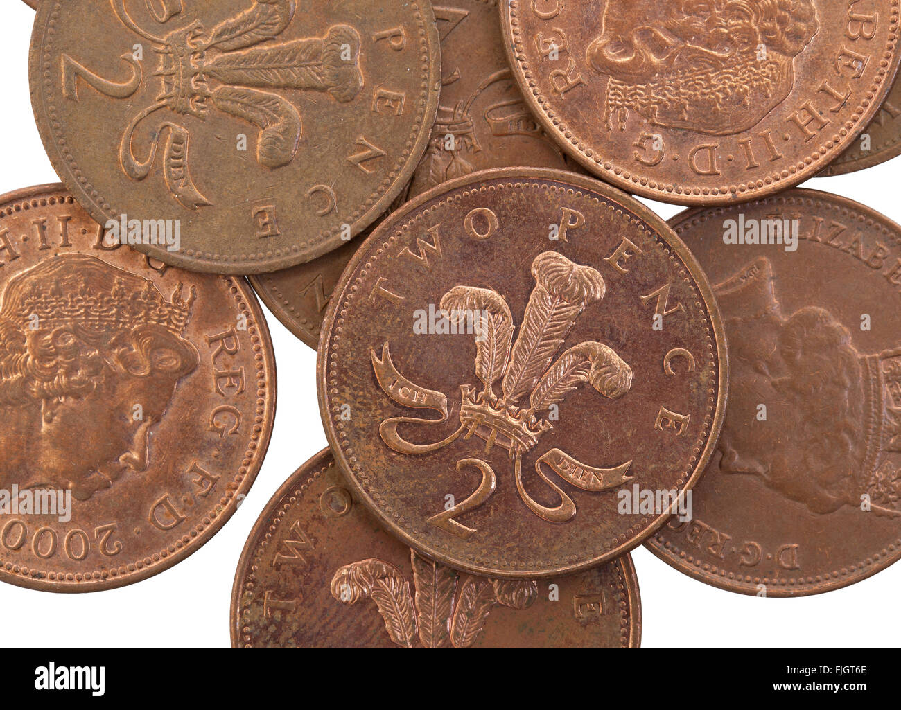 Dos peniques monedas aislado sobre un fondo blanco, el enfoque selectivo Foto de stock