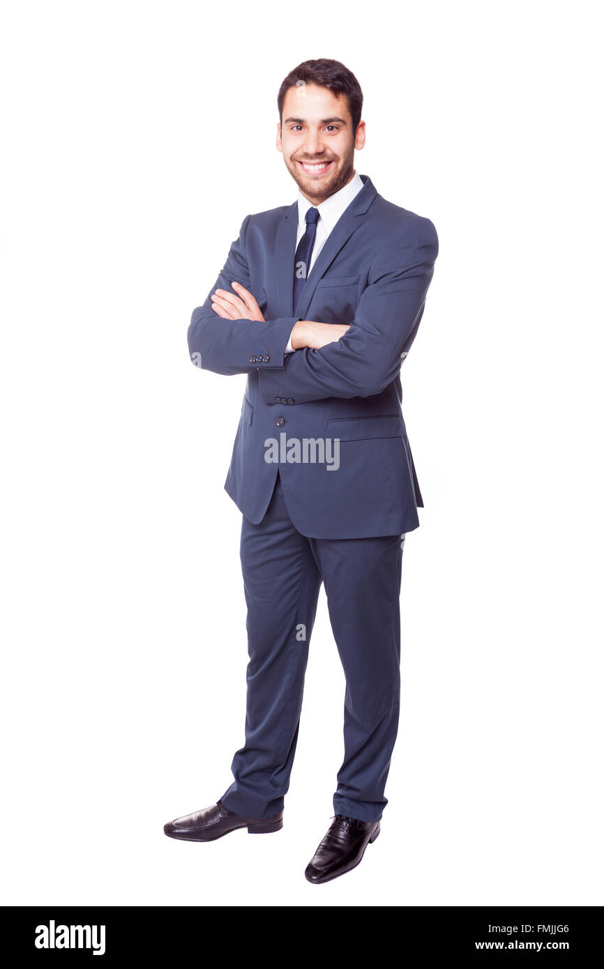 Empresario feliz con los brazos cruzados sobre un fondo blanco. Foto de stock