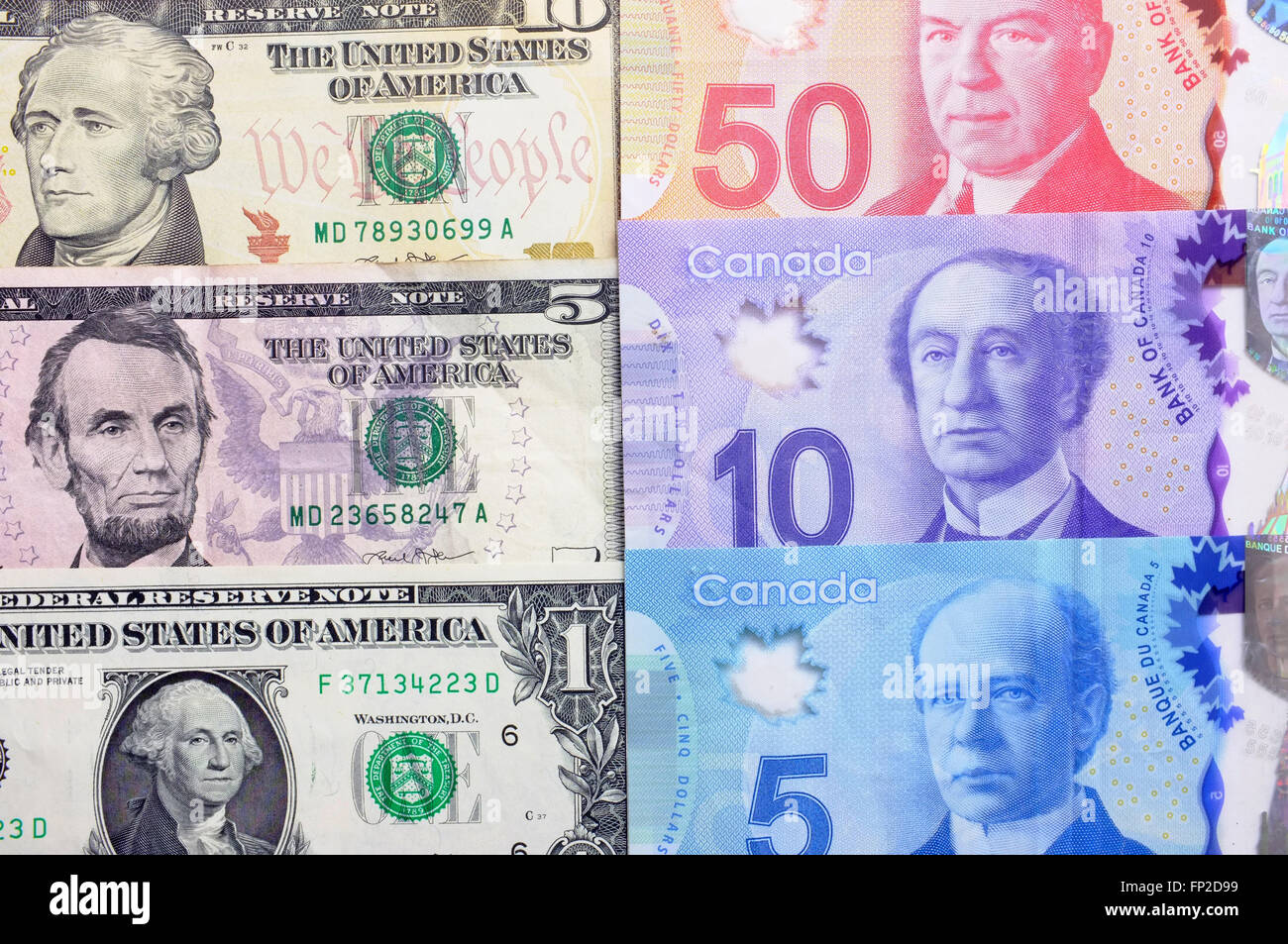 Notas de Dólar norteamericano y canadiense Fotografía de stock - Alamy