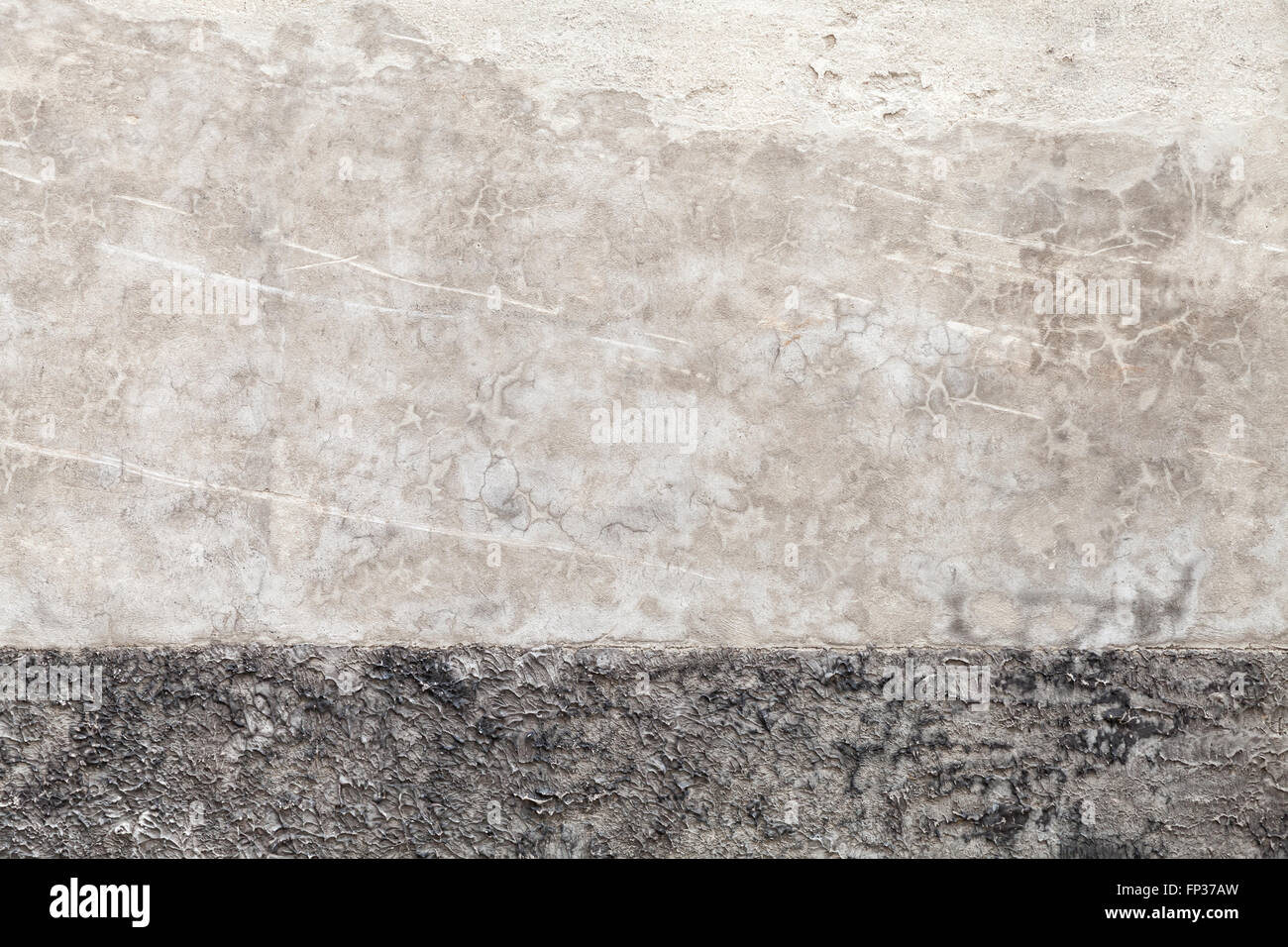Gris oscuro sucio capeado muro de hormigón, fondo textura fotográfica Foto de stock
