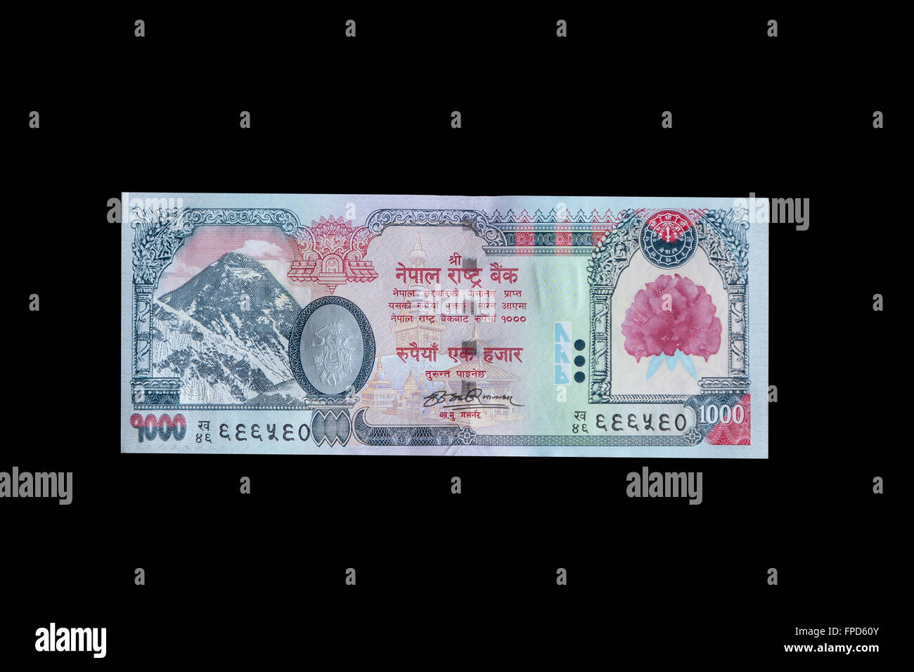 Nepal Moneda, 1000 Rupias, frontal, Mt. El Everest. Utiliza el alfabeto Devanagari. Foto de stock