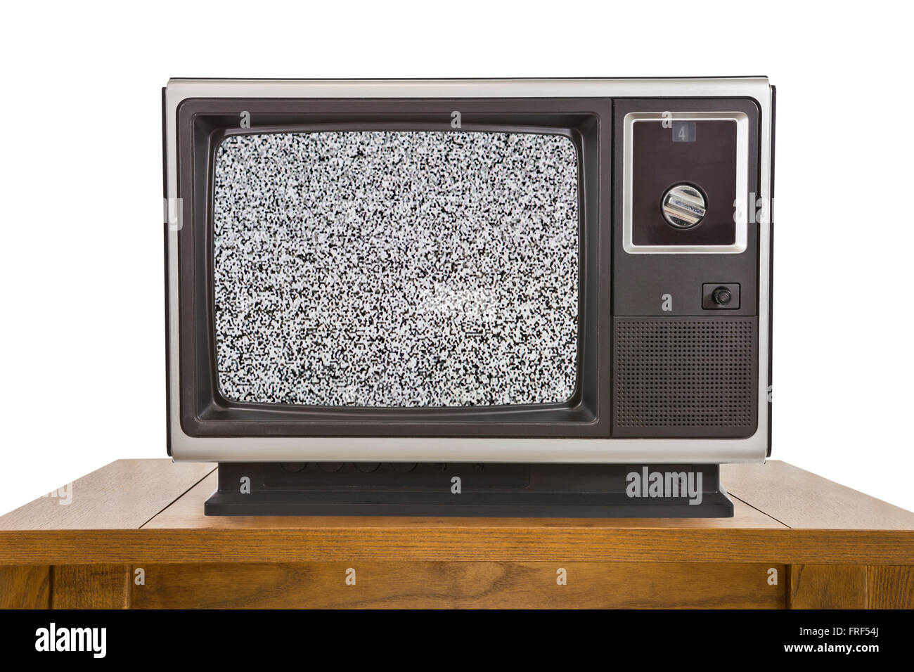 Televisión con Antena portátil antiguo sobre la mesa de madera con pantalla  estática Fotografía de stock - Alamy