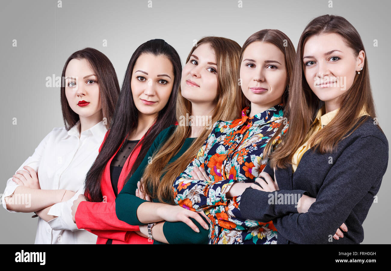 Hermosas Mujeres con manos cruzadas Foto de stock