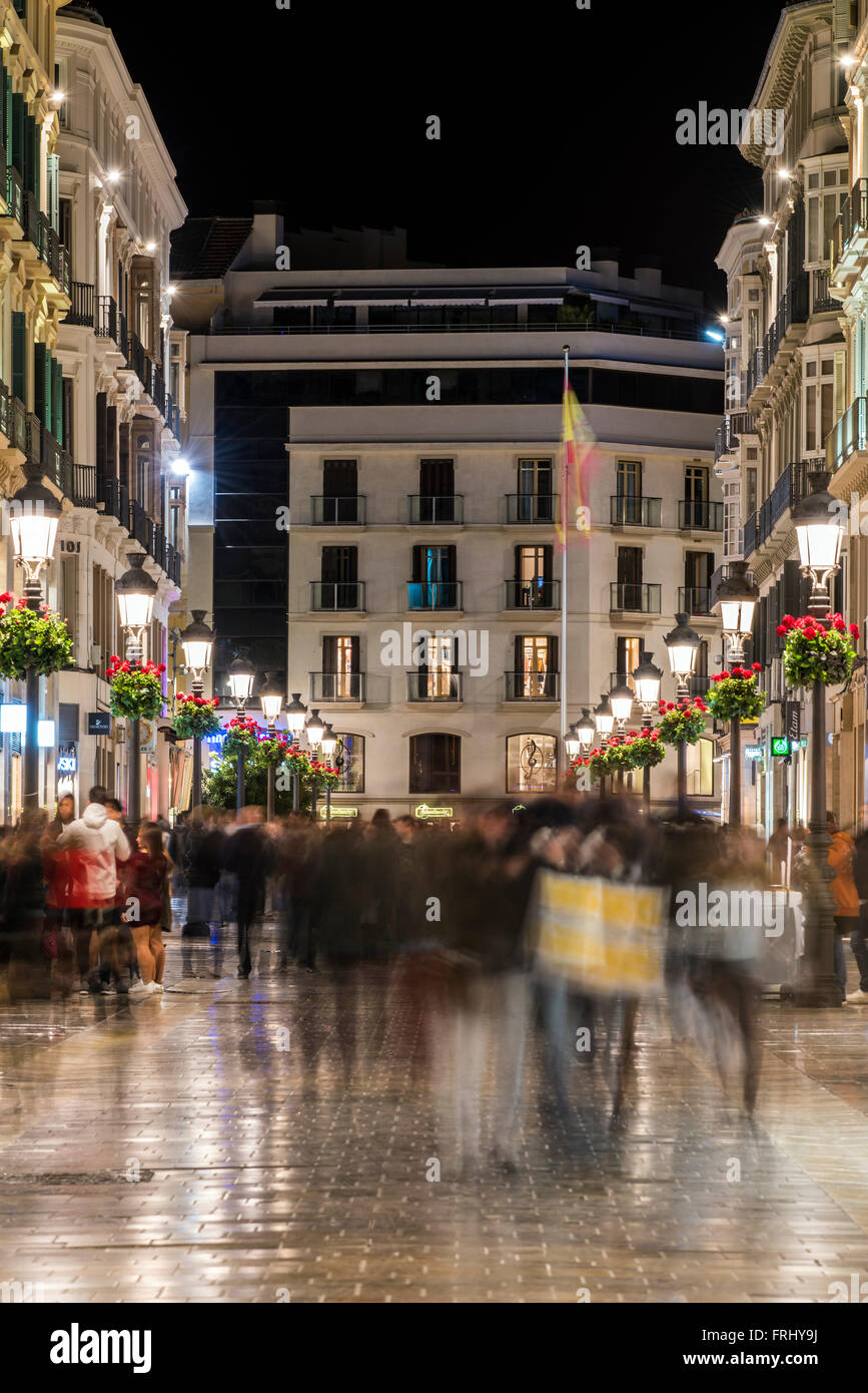 Vista nocturna de la Calle Marqués de Larios calle peatonal, Málaga, Andalucía, España Foto de stock