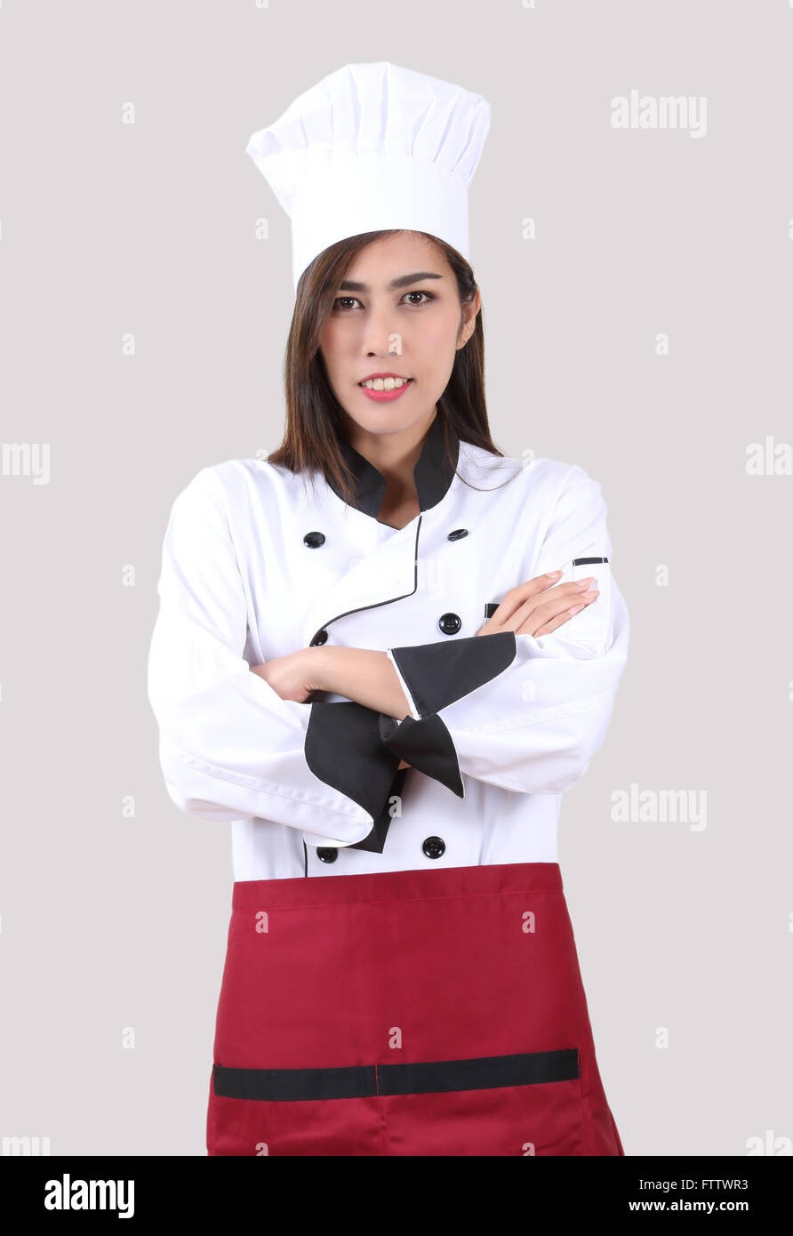 Mujer joven chef uniforme, con sombrero Fotografía de stock - Alamy