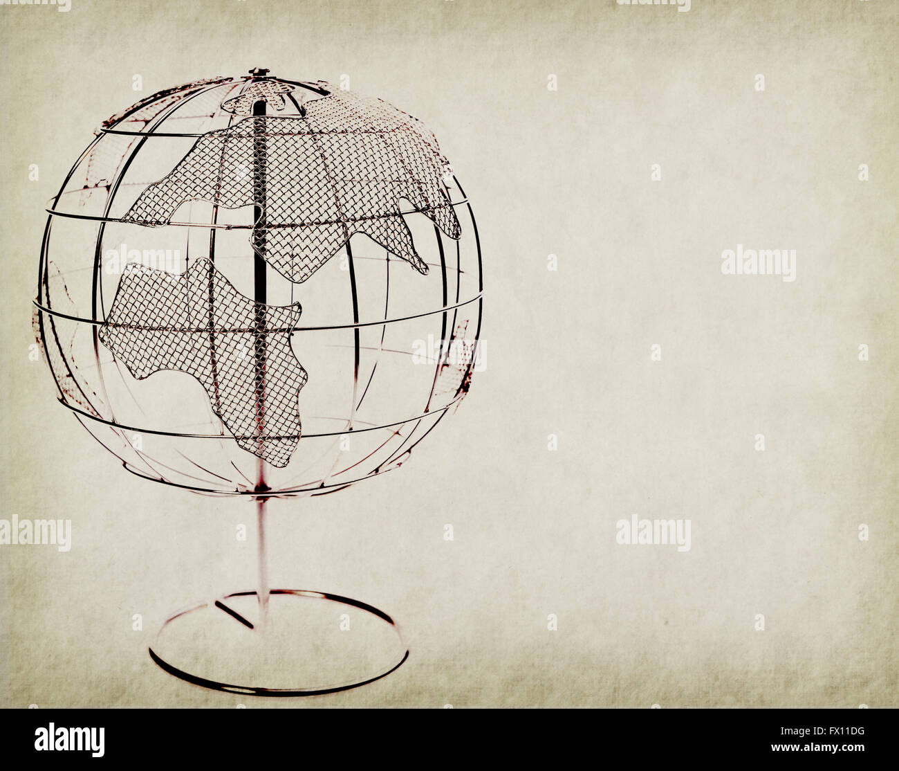 Globo terrestre sobre fondo de papel vintage antigua Fotografía de