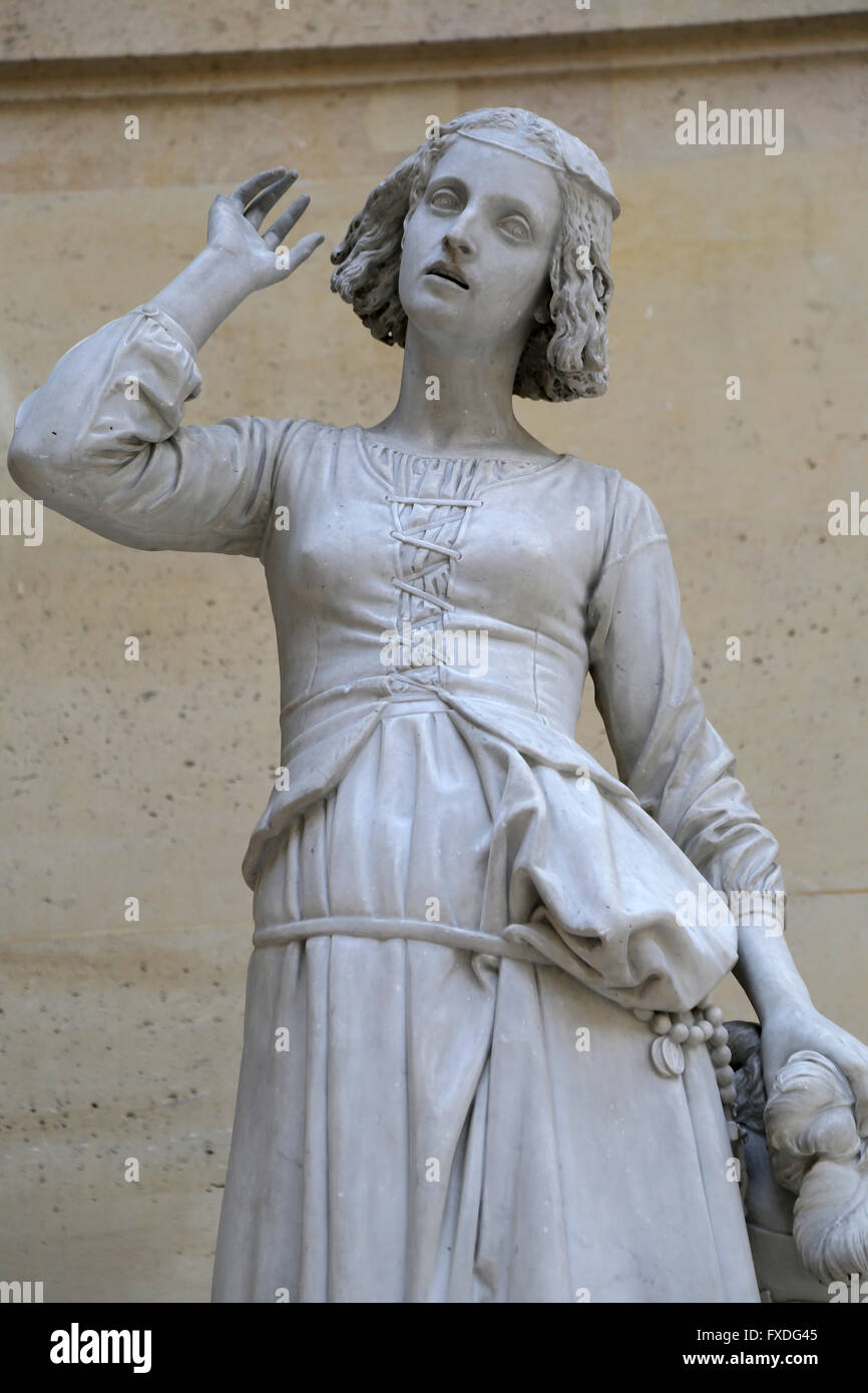 Juana de Arco (1412-1431) a escuchar sus voces. Mármol, 1852. Por Francois Rude (1784-1855). Museo del Louvre. Foto de stock