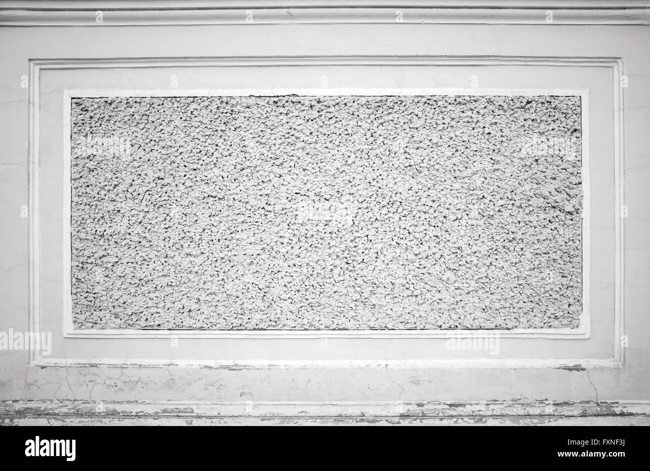 Blanco antiguo muro de piedra decorativa con bastidor de socorro, fondo textura fotográfica Foto de stock