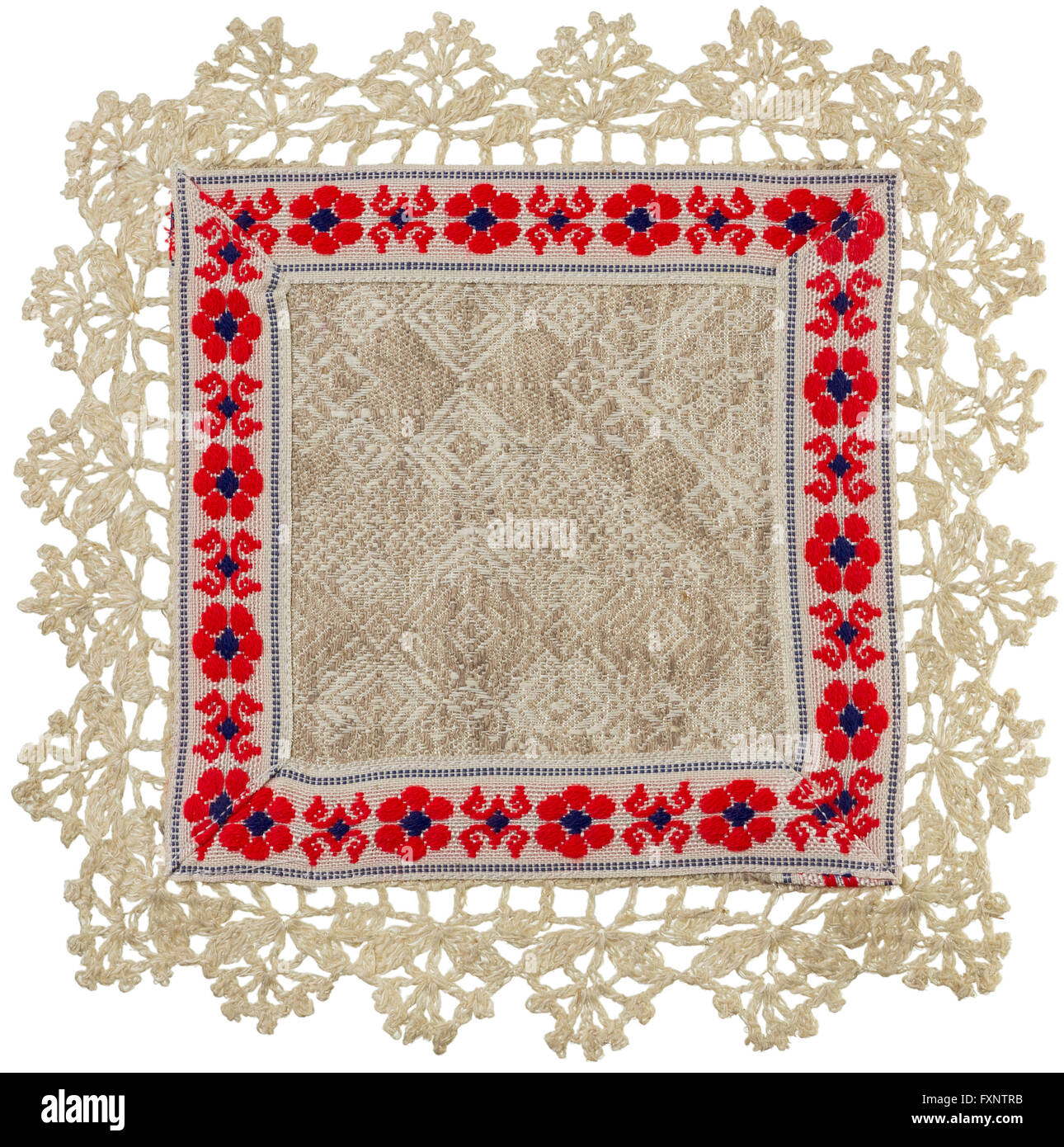 Tabla de lino Hand-Knitted servilleta con ornamento aislado Foto de stock