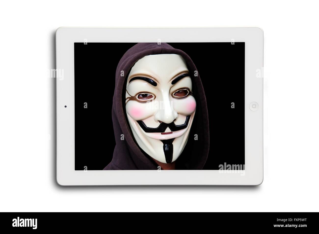 Máscara anónimo en una tableta digital, ordenador ilustraciones. Foto de stock