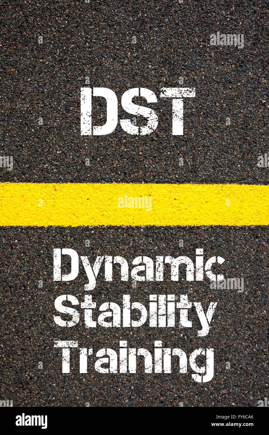 Concepto de imagen Business Acrónimo DST estabilidad dinámica formación escrito encima de la señalización de la línea de pintura amarilla Foto de stock