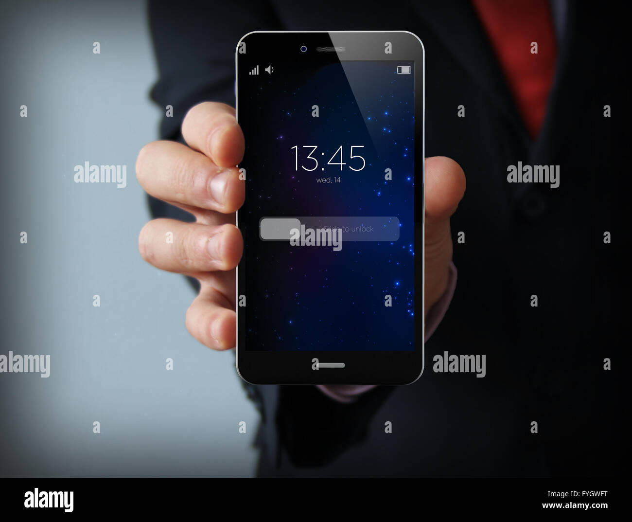 El concepto de comunicaciones inalámbricas y de movilidad: empresario mano sujetando un teléfono táctil Foto de stock