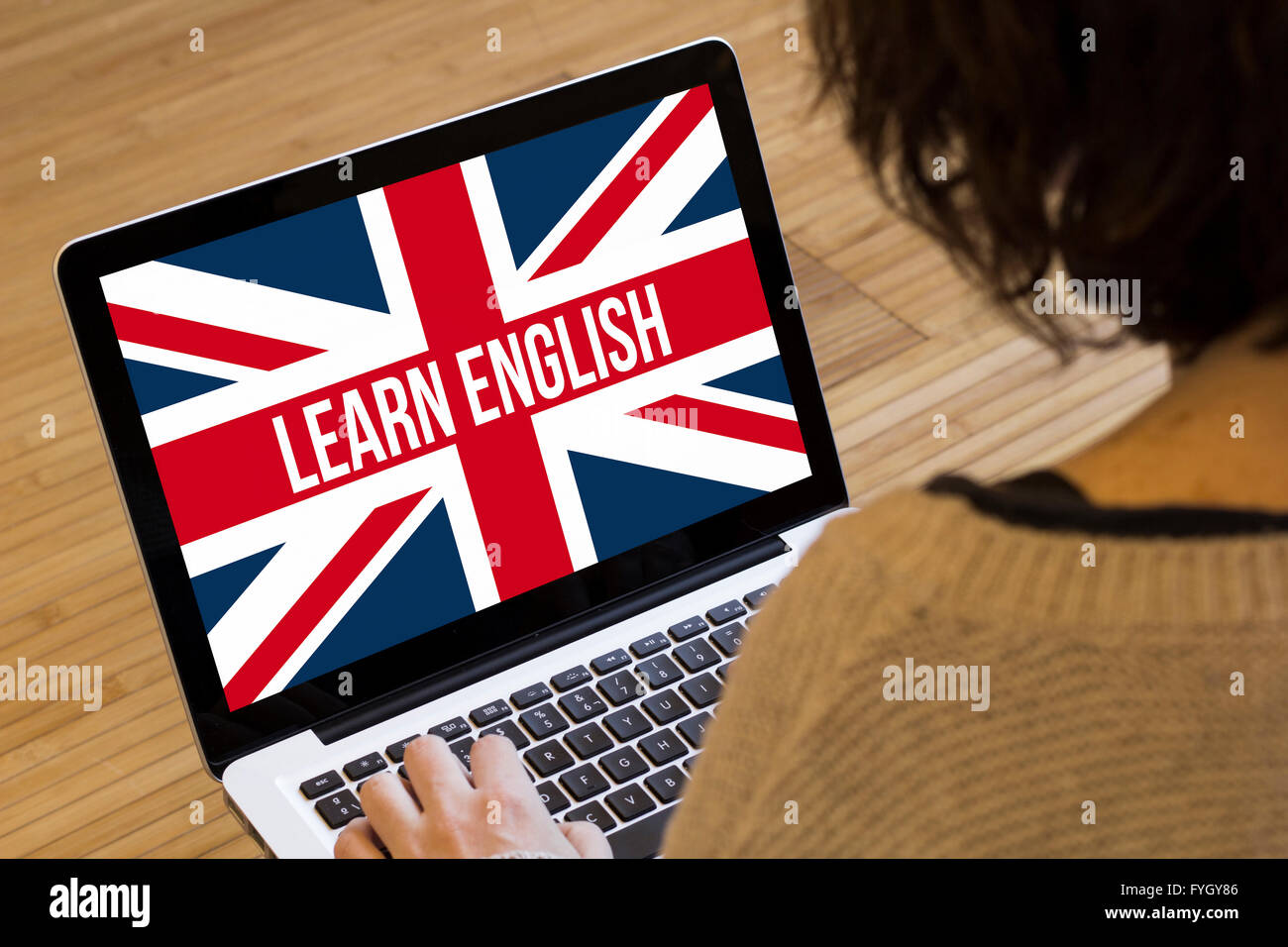 Aprender idiomas en línea concepto: aprender inglés en una pantalla de  ordenador portátil. Gráficos de pantalla se compone Fotografía de stock -  Alamy