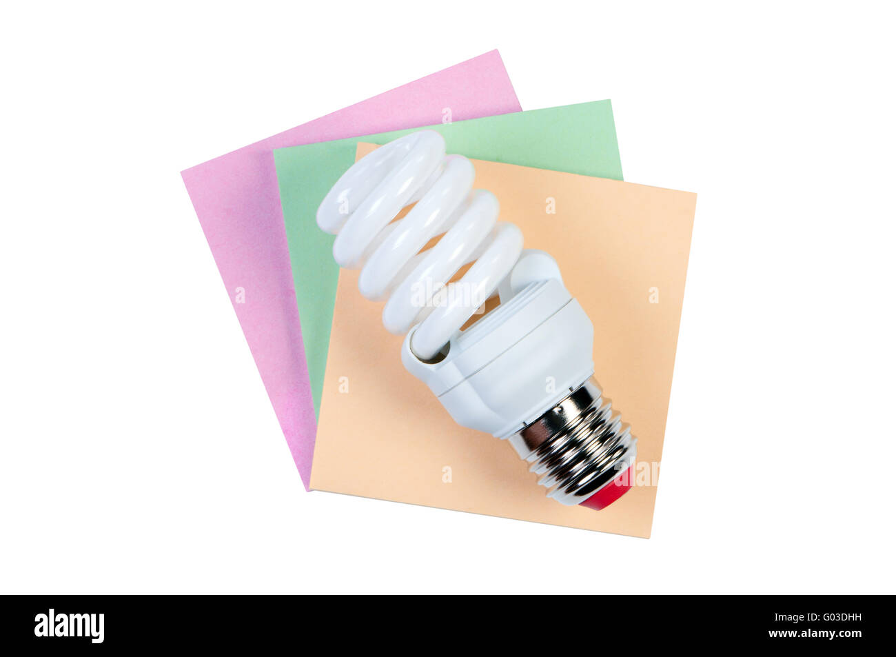 Lámpara de ahorro de energía y pegatinas de color aislado sobre fondo blanco. Foto de stock