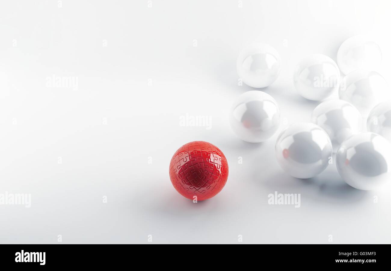 Esfera Blanca y la esfera roja en un tipo puzzle Foto de stock