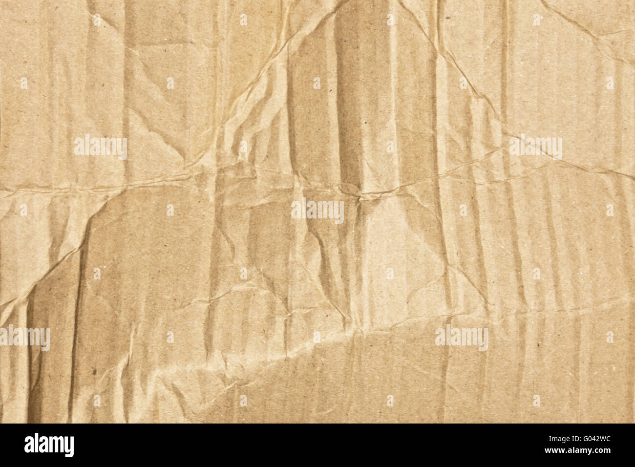 Textura de cartón ondulado marrón Foto de stock