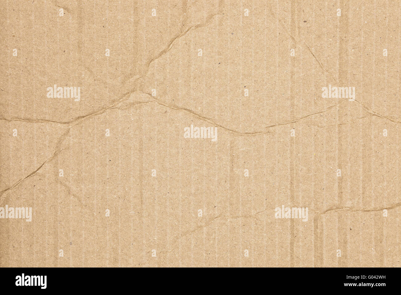 Textura de cartón ondulado marrón Foto de stock
