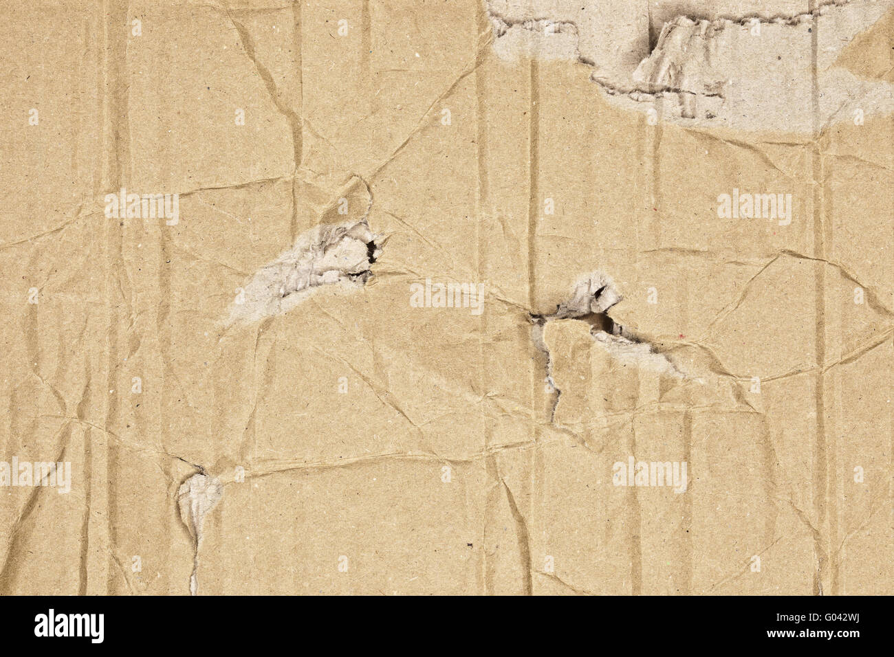 Textura de cartón ondulado marrón Foto de stock