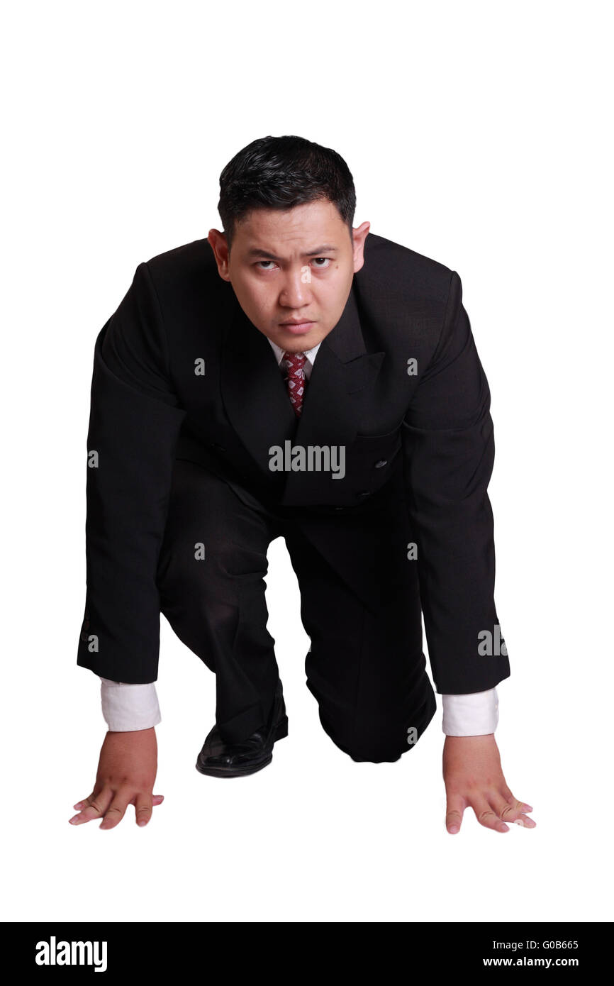 Concepto de negocio la imagen de un empresario asiático en la posición de arranque listo para ejecutar Foto de stock