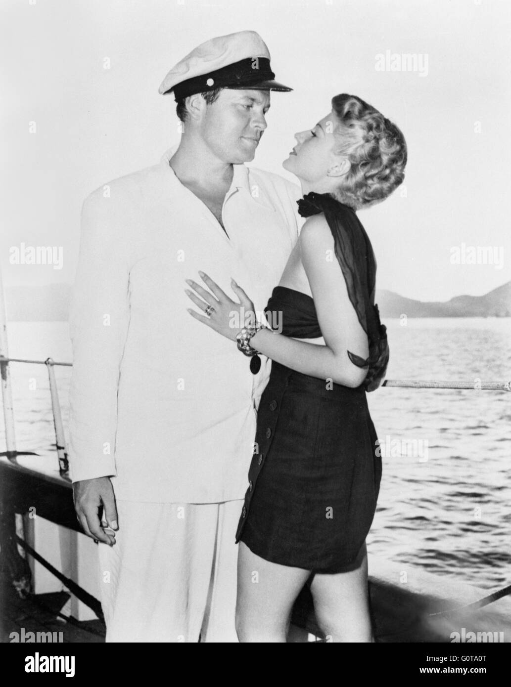 Orson Welles y Rita Hayworth / La dama de Shanghai / 1948 dirigida por Orson Welles (Columbia Pictures) Foto de stock