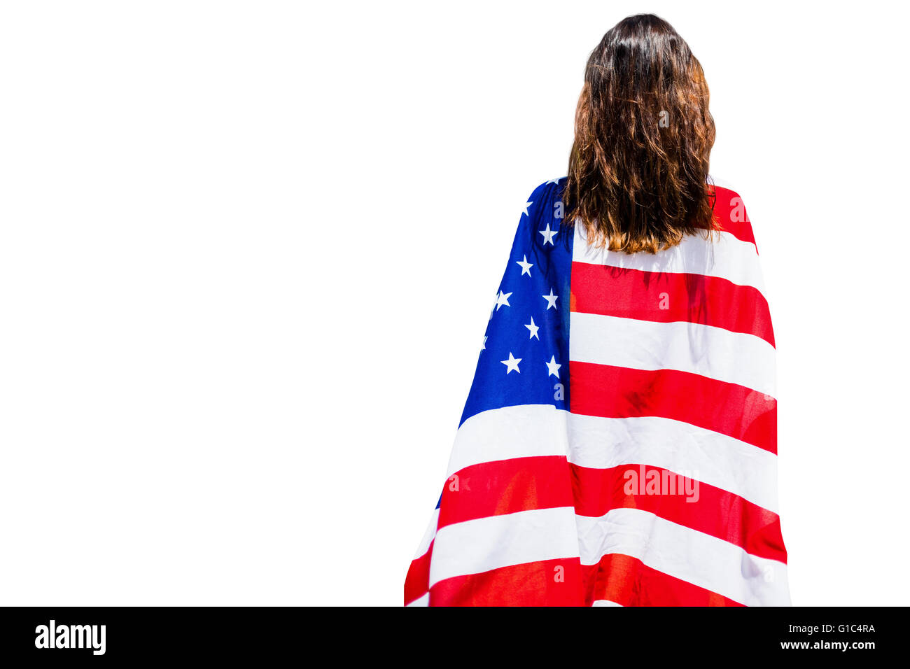 Vista trasera del deportivo de mujer sosteniendo una bandera americana Foto de stock