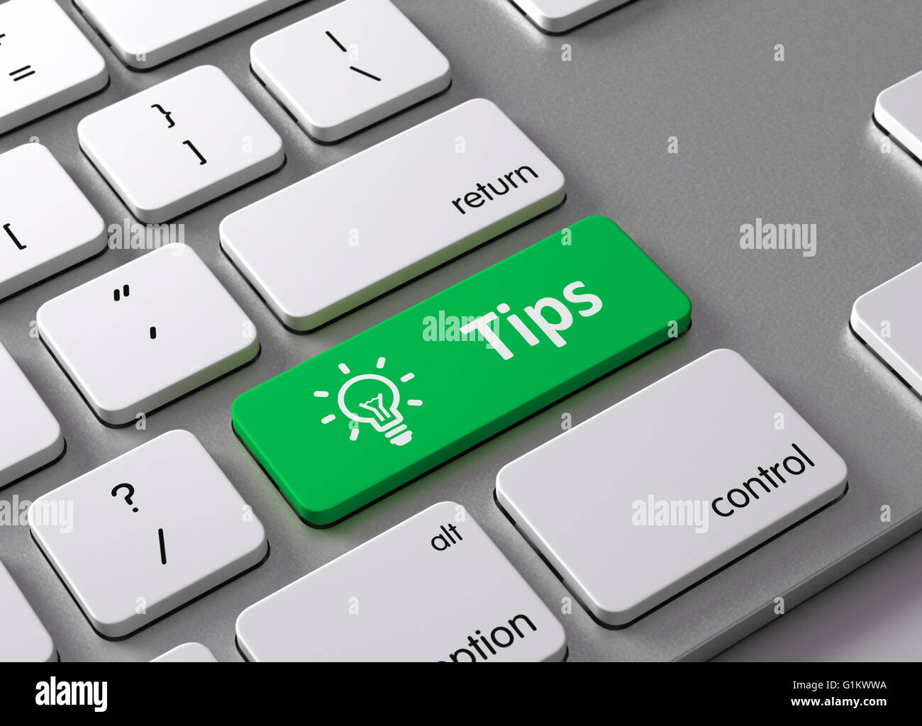 Un teclado con un botón verde Consejos Foto de stock