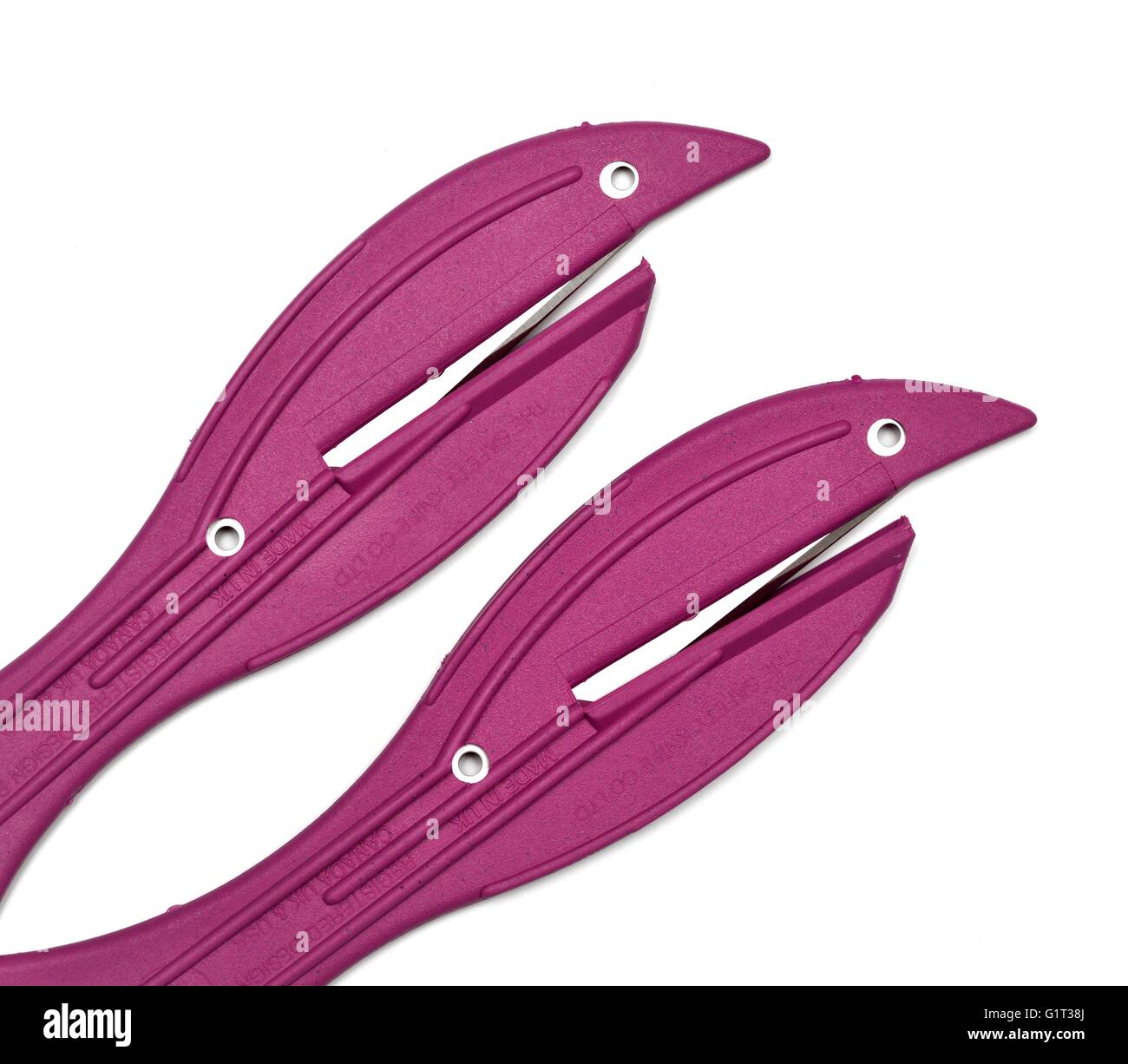 Dos púrpura peces Seguridad cuchillas. Foto de stock