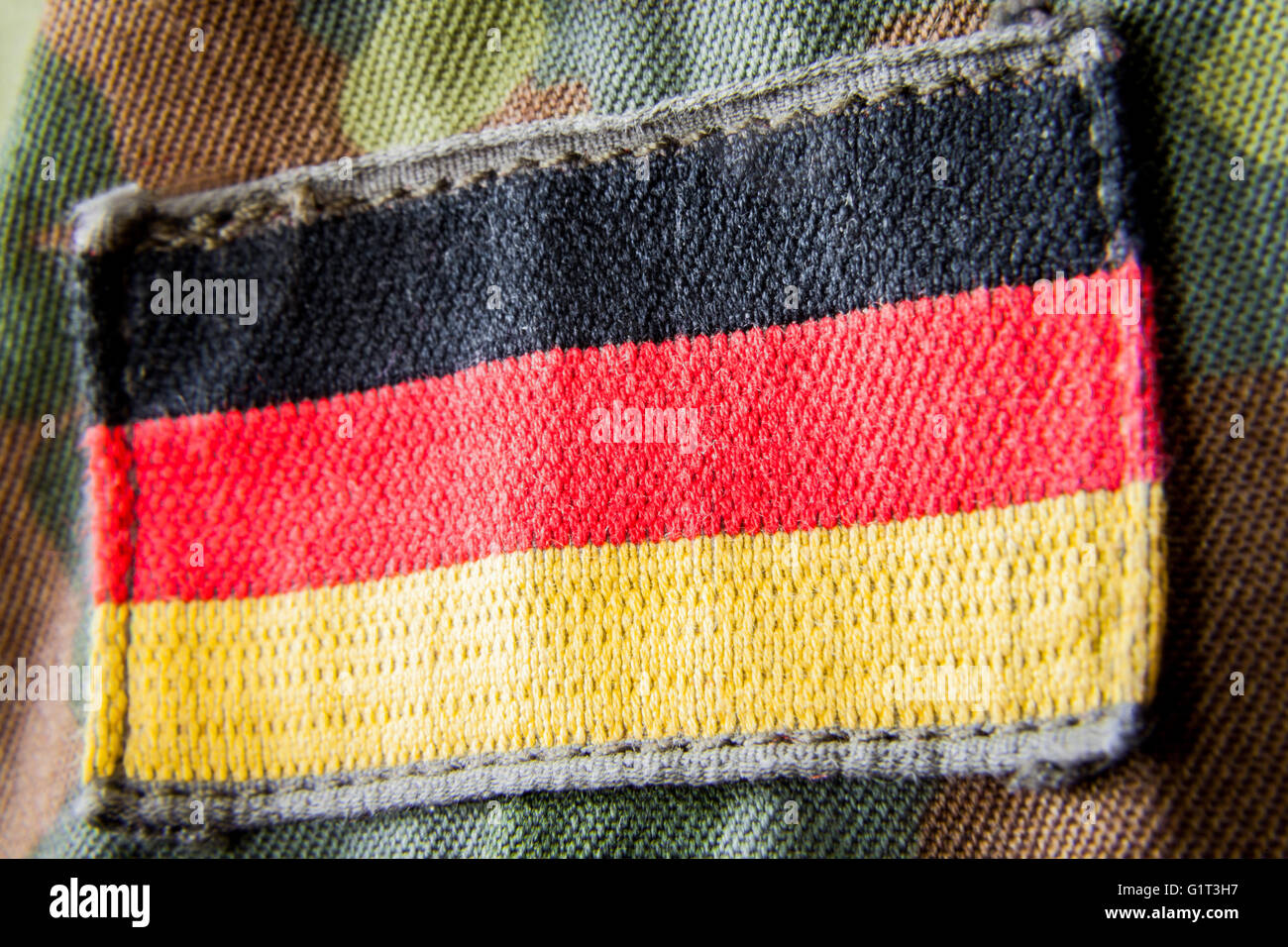 Bandera Alemana appliquéd en chaqueta militar Fotografía de stock - Alamy