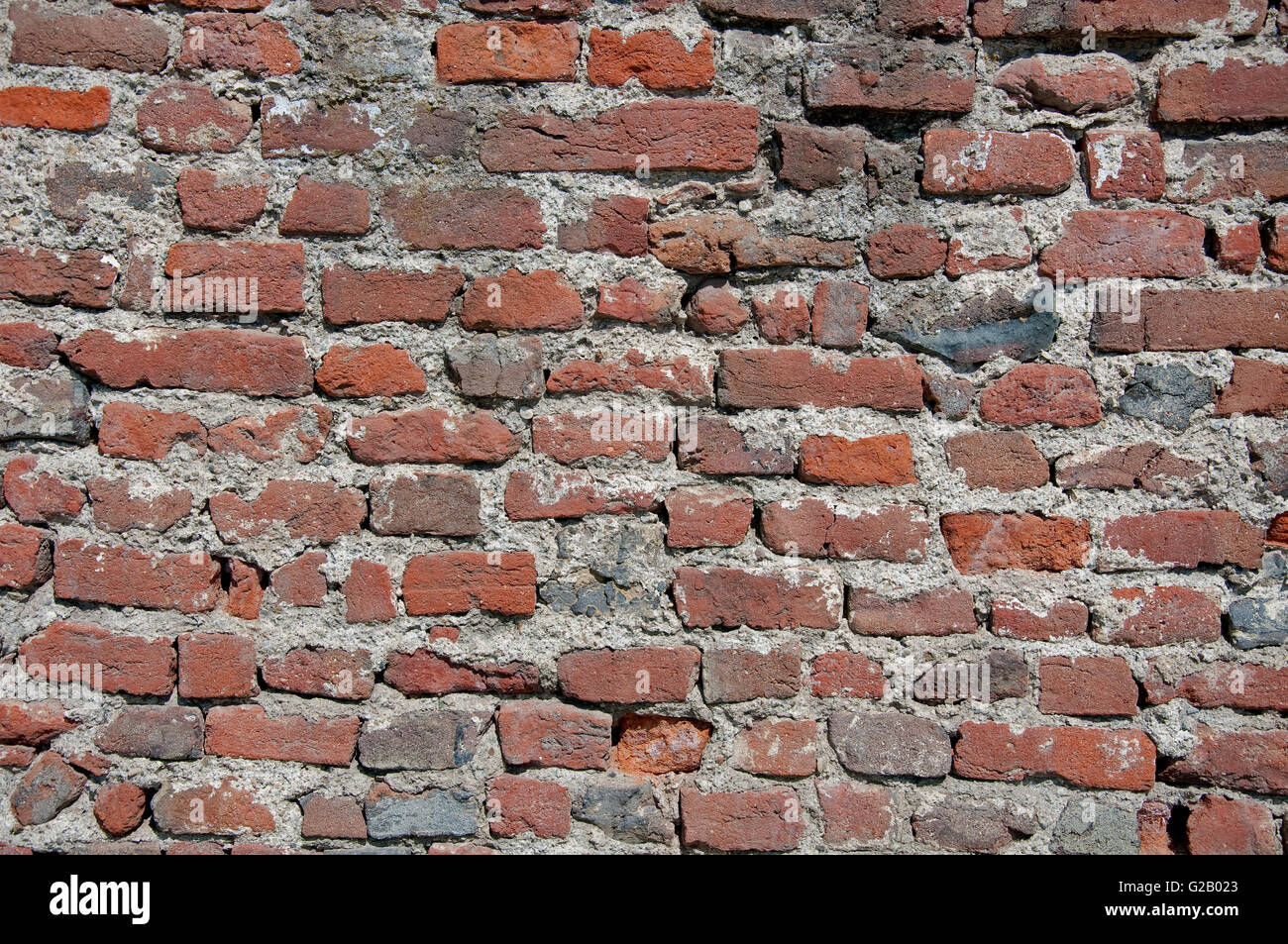 Viejo muro de ladrillos sin cemento vistas,textura abstracta arte antigüedades subieron a bordo agrietada de color marrón chip carpintero detalle de diseño Foto de stock