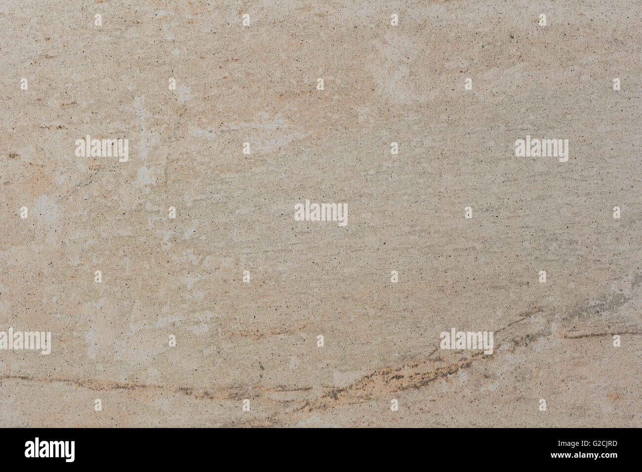 Esto es una losa de piso, con una textura de color beige. Foto de stock