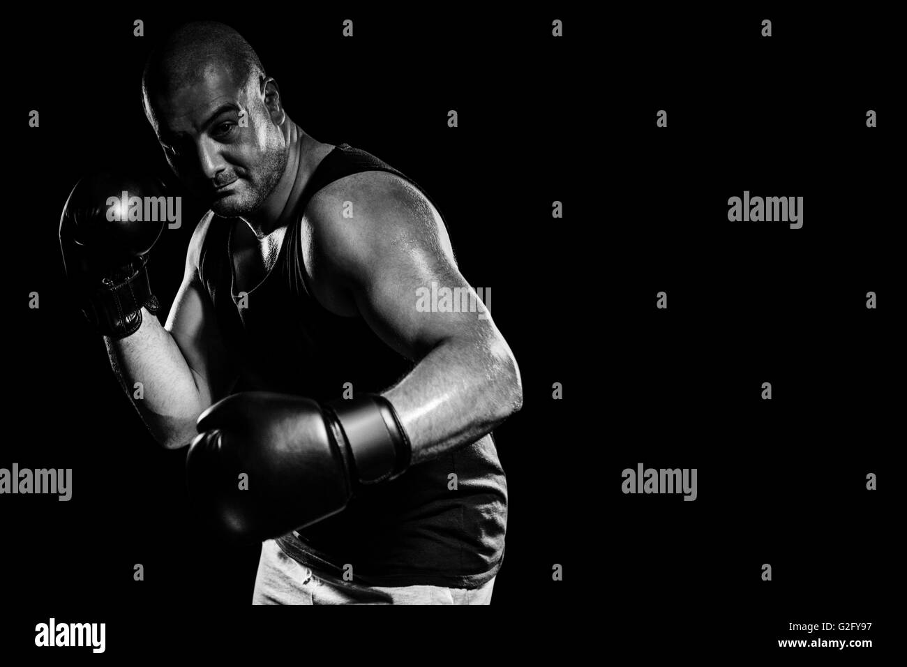 Imagen compuesta de boxeador realizar postura de boxeo Foto de stock