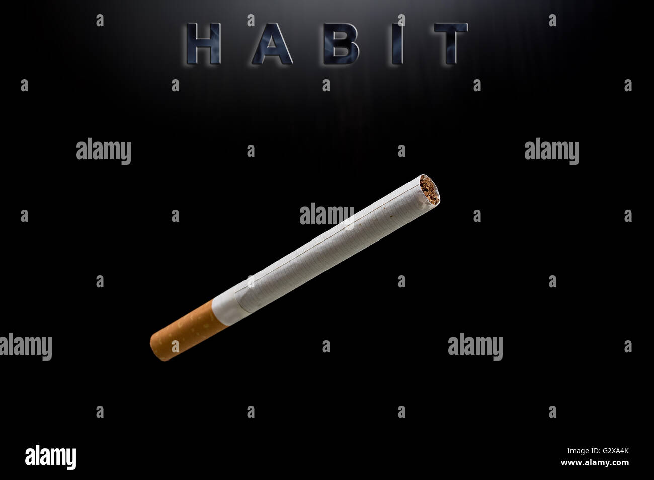 Cigarrillos y hábito de texto Foto de stock