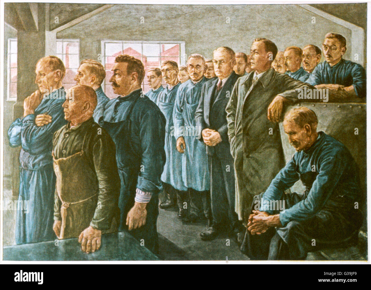 "BROADCAST" montado en fábrica un grupo de trabajadores de fábrica de sexo masculino escuchar con asombro y reflexión a una radio de difusión de propaganda por el Fuhrer, Adolf Hitler. Fecha: Tercer Reich Foto de stock