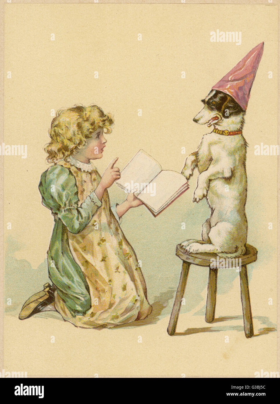 Una joven intenta enseñar a su perro nuevos trucos. Fecha: circa 1890 Foto de stock