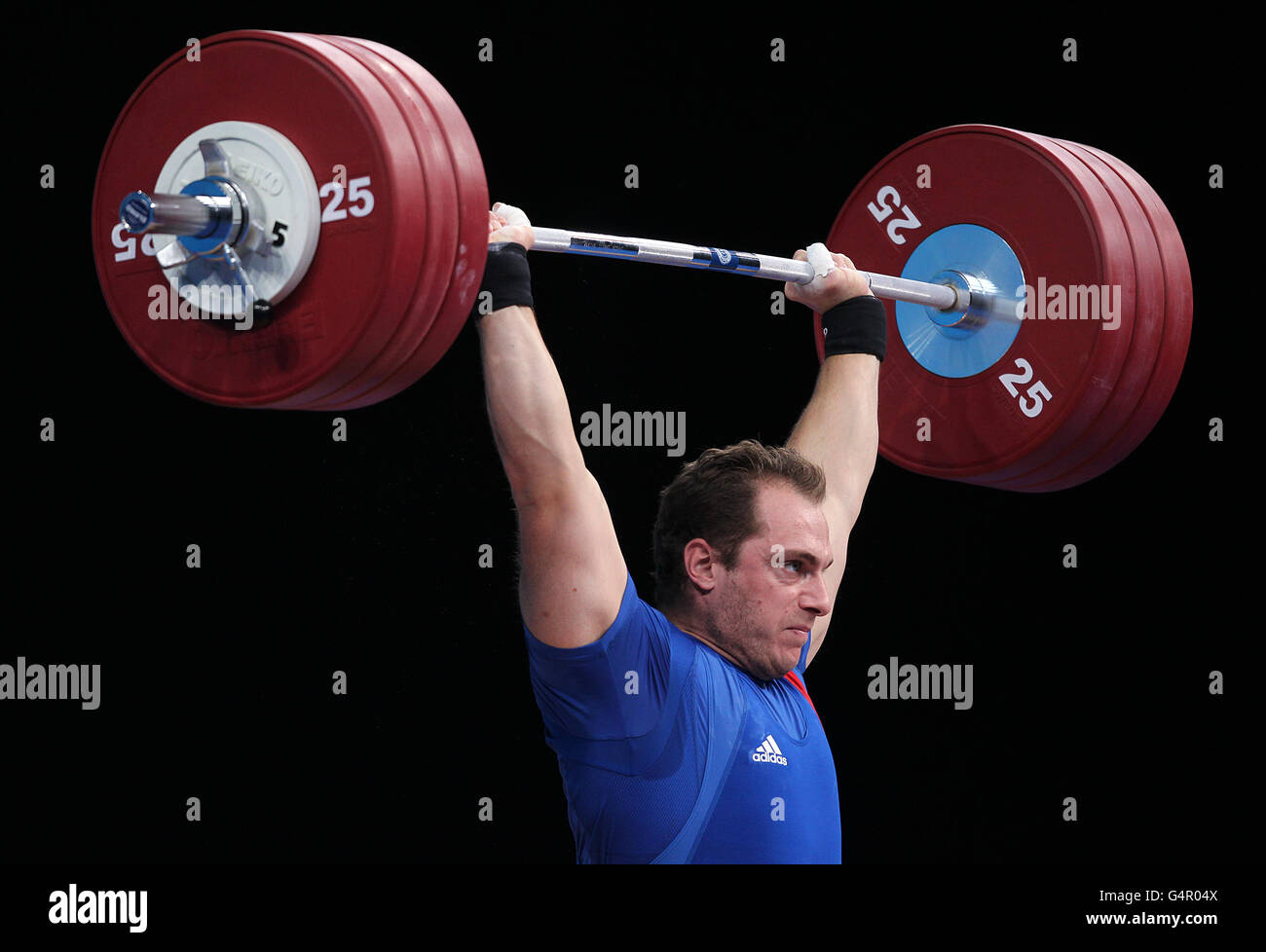Olimpiadas - Weightlifting - London 2012 Test Event - Day Two - Excel Arena. Dmitry Kaplan de Kazajstán Foto de stock
