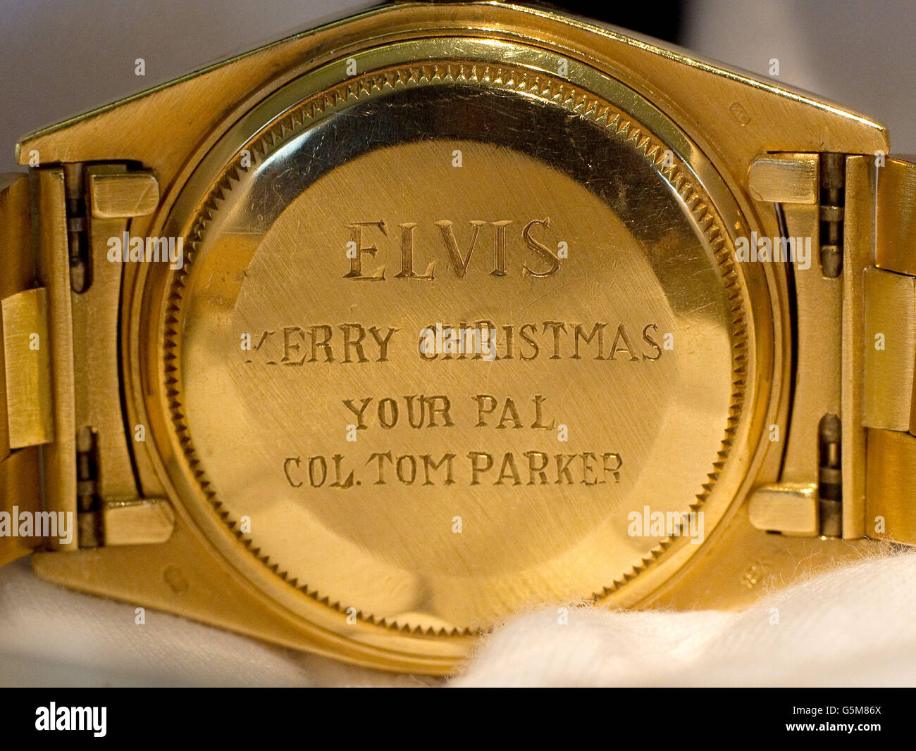 Un reloj Rolex de 18ct de oro dado a Elvis por su gerente en 1976 grabado  en el reverso es 'Elvis feliz Navidad su amigo el Coronel Tom Parker' que  se vende