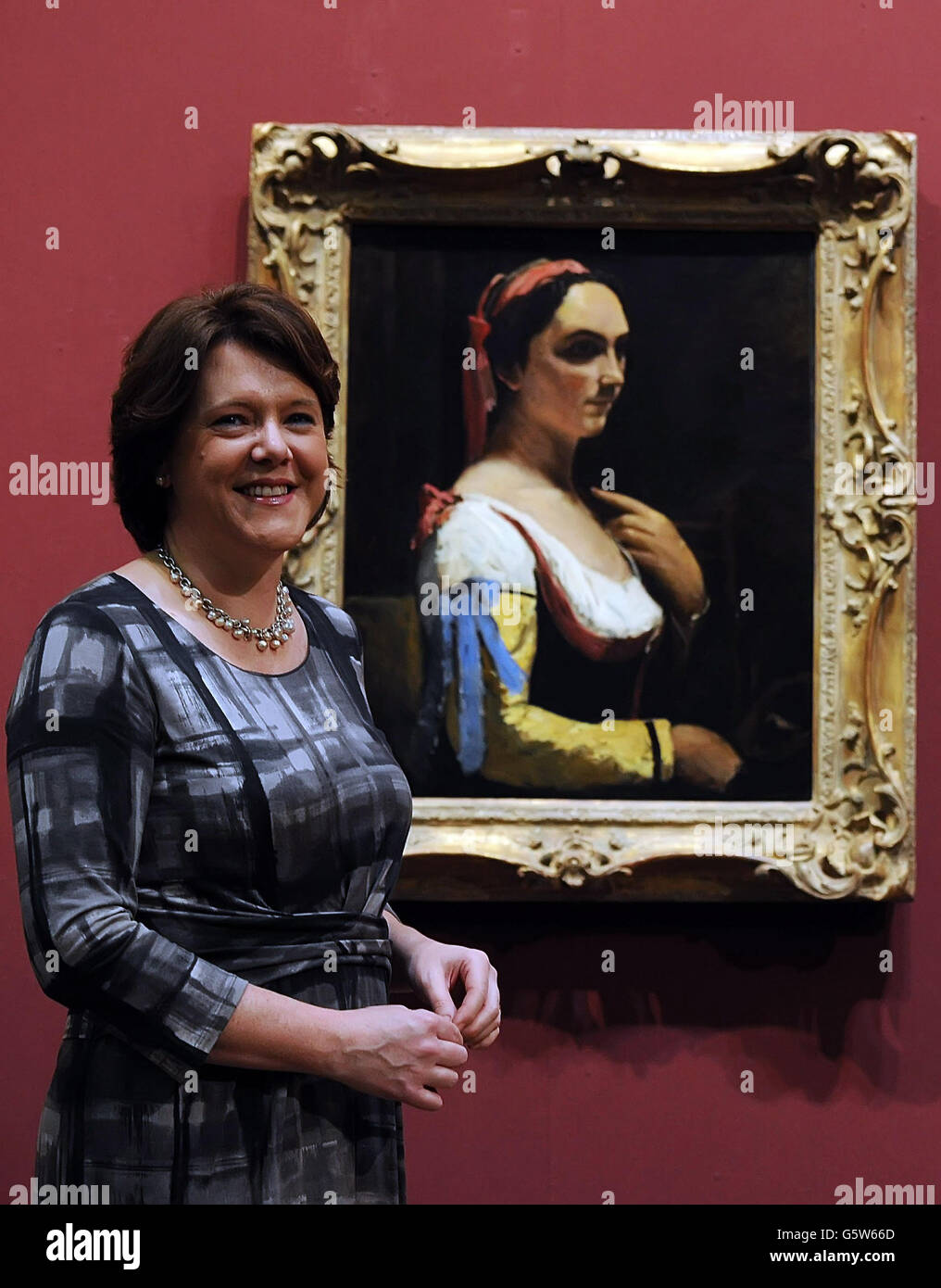 La Secretaria de Cultura Maria Miller desvela la pintura de Jean Baptiste Corot ' L'Italienne ou La Femme a la Manche Jaune' en la Galería Nacional. La pintura fue dada Cortesía de la finca del difunto Lucien Freud. Foto de stock