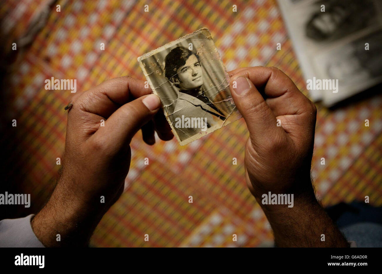 Fotografía del fadil desaparecido en Shuhaba, al sur de Irak. Dan Chung/Guardian/MOD Pool. Foto de stock