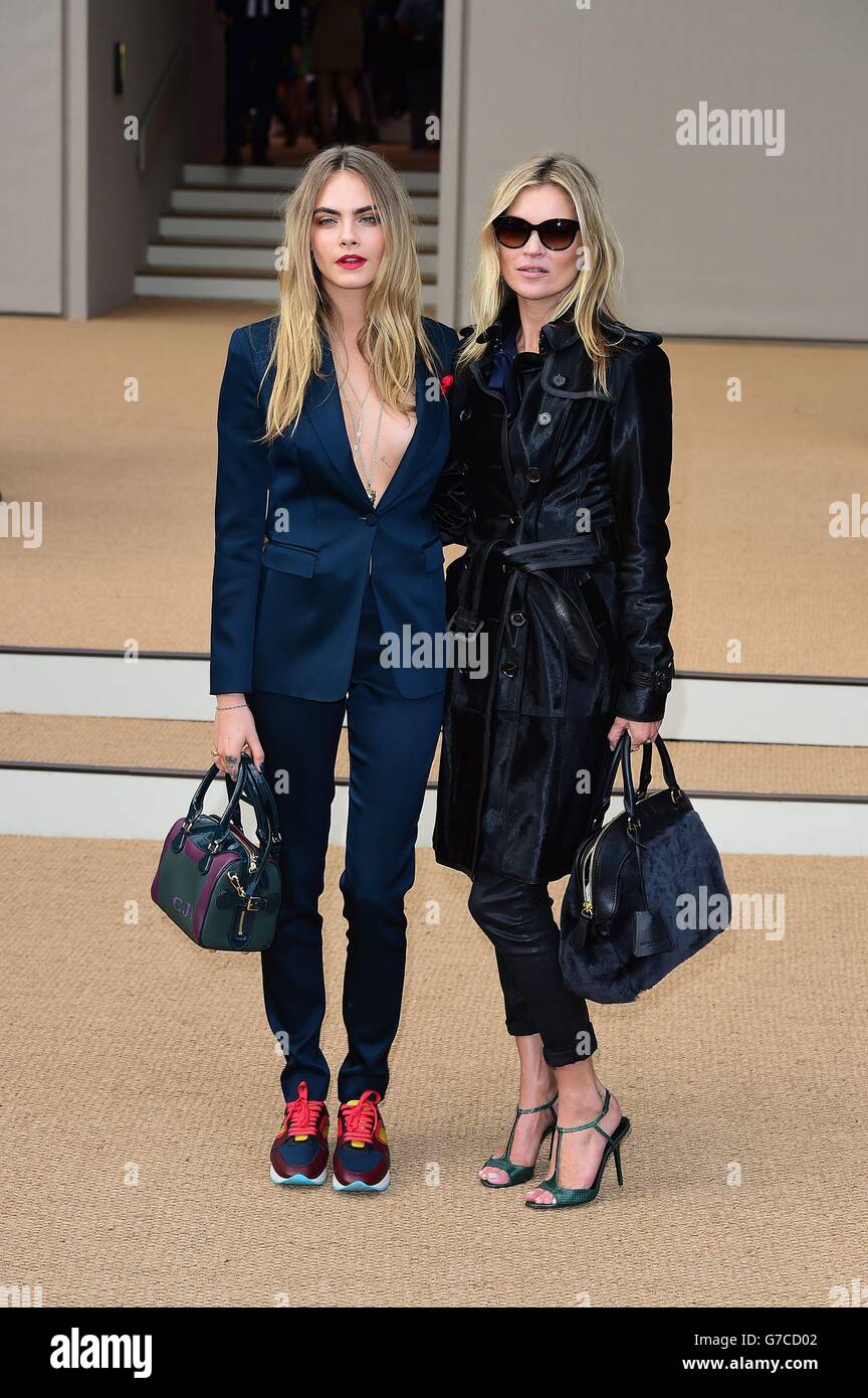 Cara Delevingne (izquierda) y Kate Moss llegan el espectáculo de pasarela de ropa de mujer Burberry en el Albert Memorial, Londres, durante la Semana de Moda de Londres