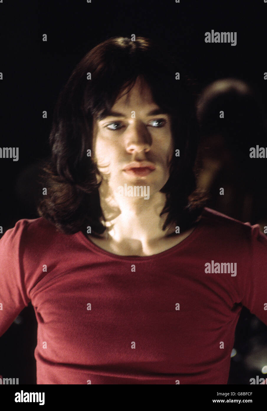 Mick Jagger, cantante de The Rolling Stones, fotografiado como la película de la banda en los estudios de LWT (London Weekend Television) en Londres. Foto de stock