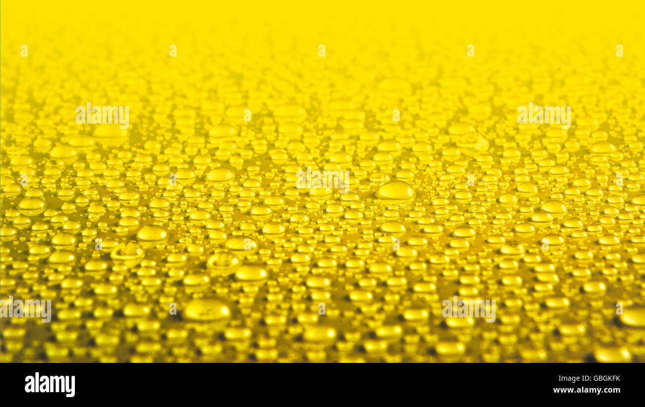 Gotas de agua amarilla textura. Antecedentes de la gota de agua Foto de stock