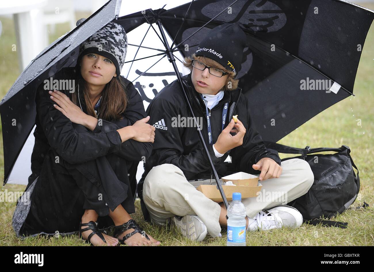 Paraguas de golf fotografías e imágenes de alta resolución - Alamy
