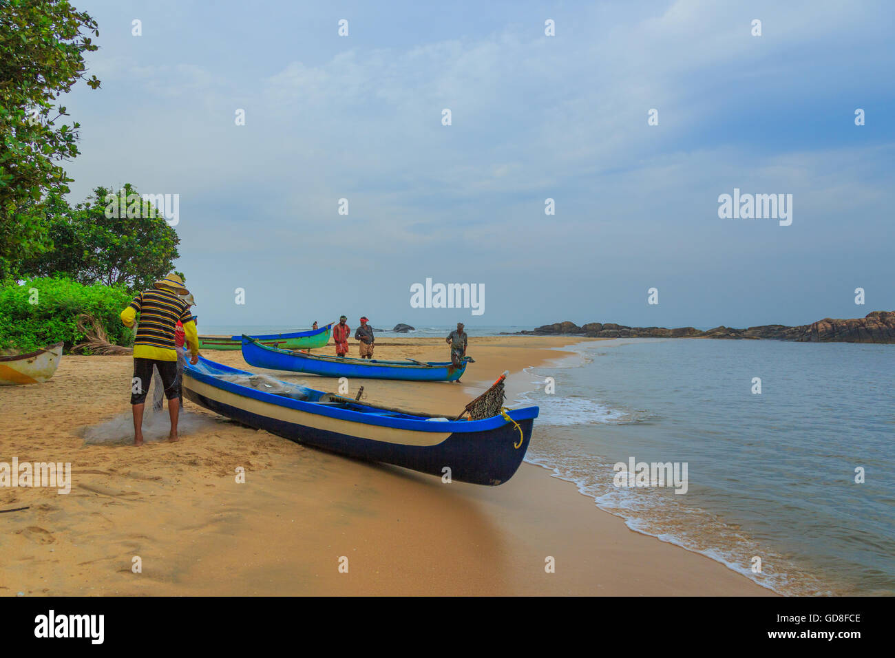 Los pescadores de Kannur Playa (Kerala) Foto de stock
