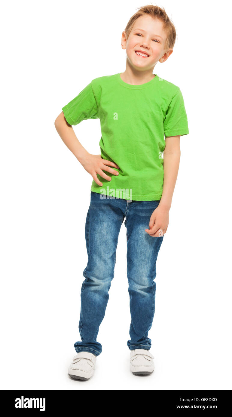 Feliz rubio muchacho de camiseta verde y vaqueros Foto de stock