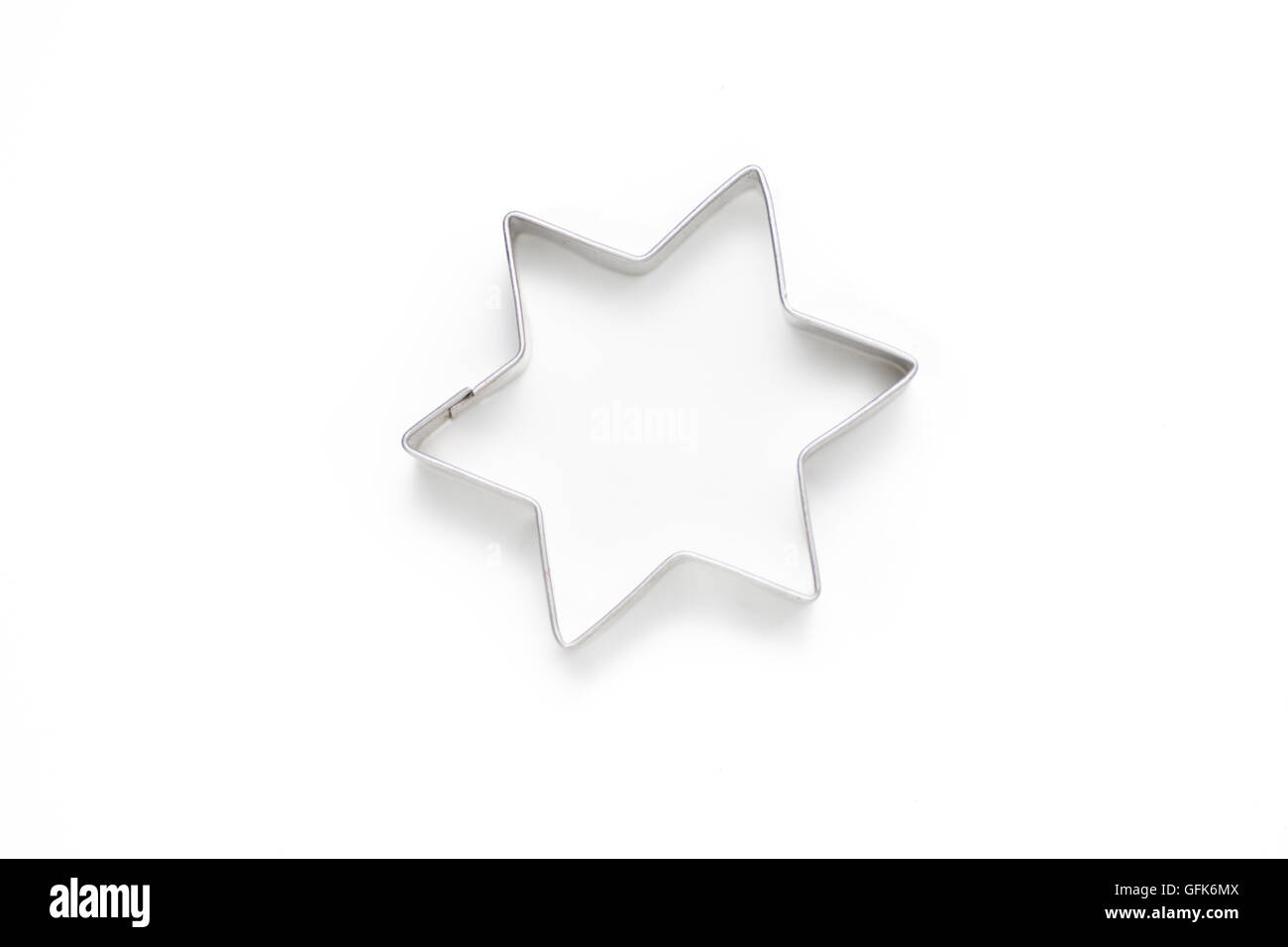 Cookie Cutter: Estrella blanca sobre fondo aislado Foto de stock