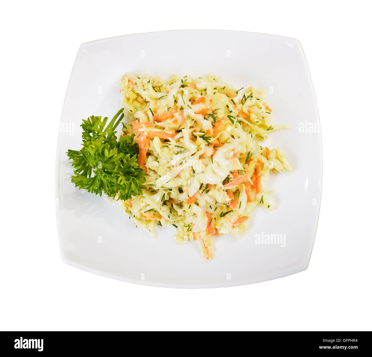 Plato de ensalada de repollo y zanahoria (coleslaw) Vista desde arriba sobre blanco Foto de stock