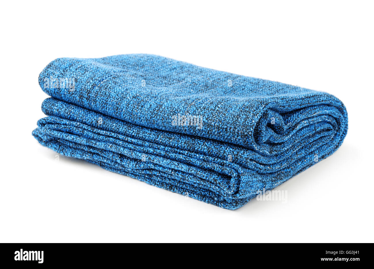 Azul plegada manta cálida aislado en blanco Foto de stock