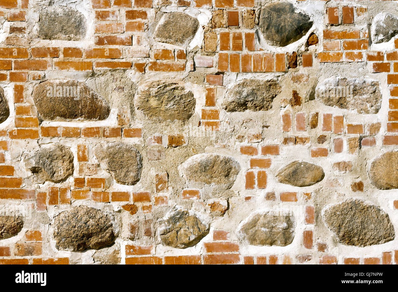 Textura de pared de piedra con ladrillos Foto de stock