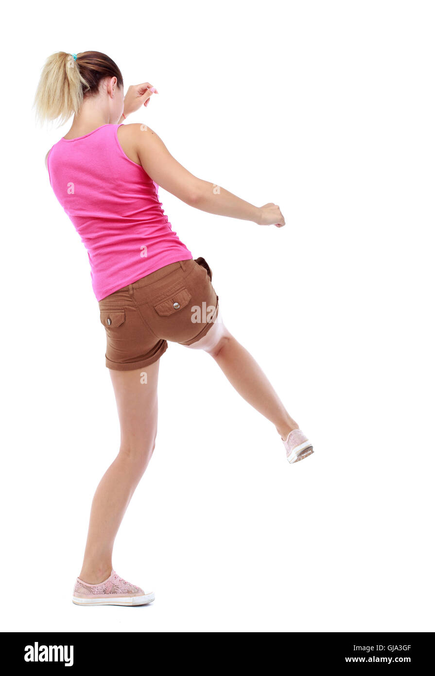 Vista posterior de la mujer funny peleas agitando los brazos y las piernas  Fotografía de stock - Alamy